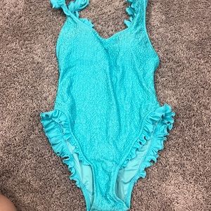 Womens blue one piece swim top ruffle detail